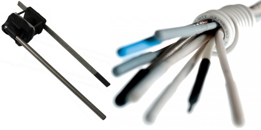 Temperatuuriandur juhtmete ja pistikuga, kasutusel elektroonikas või tööstuses.